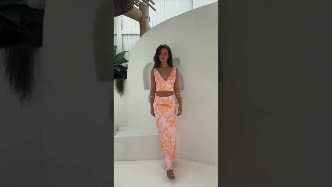 Set of the Summer ☀️ Shop Dahlia Orange And Pink Floral Print Crop Top and Skirt online now!