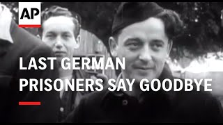 LAST GERMAN PRISONERS SAY GOODBYE