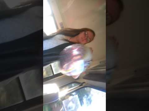 Bored on the bus with a helium balloon