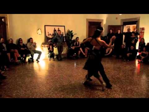  Maria Ines Bogado  and  Sebastian Jimenez  are  dancing  to  the  milonga  "  Flor de Monserrat  "