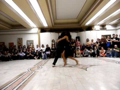  Adrian Veredice  and  Alejandra Hobert  are  dancing  to  the  tango  "  Pura Clase  "  by  Rodolfo Biagi  in  2009