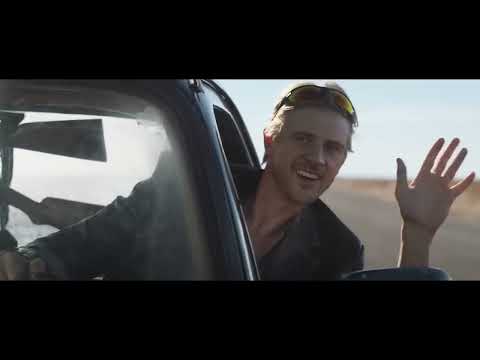Vengeance (2022) official trailer still of BJ Novak’s Ben driving West Texas backroads at dusk