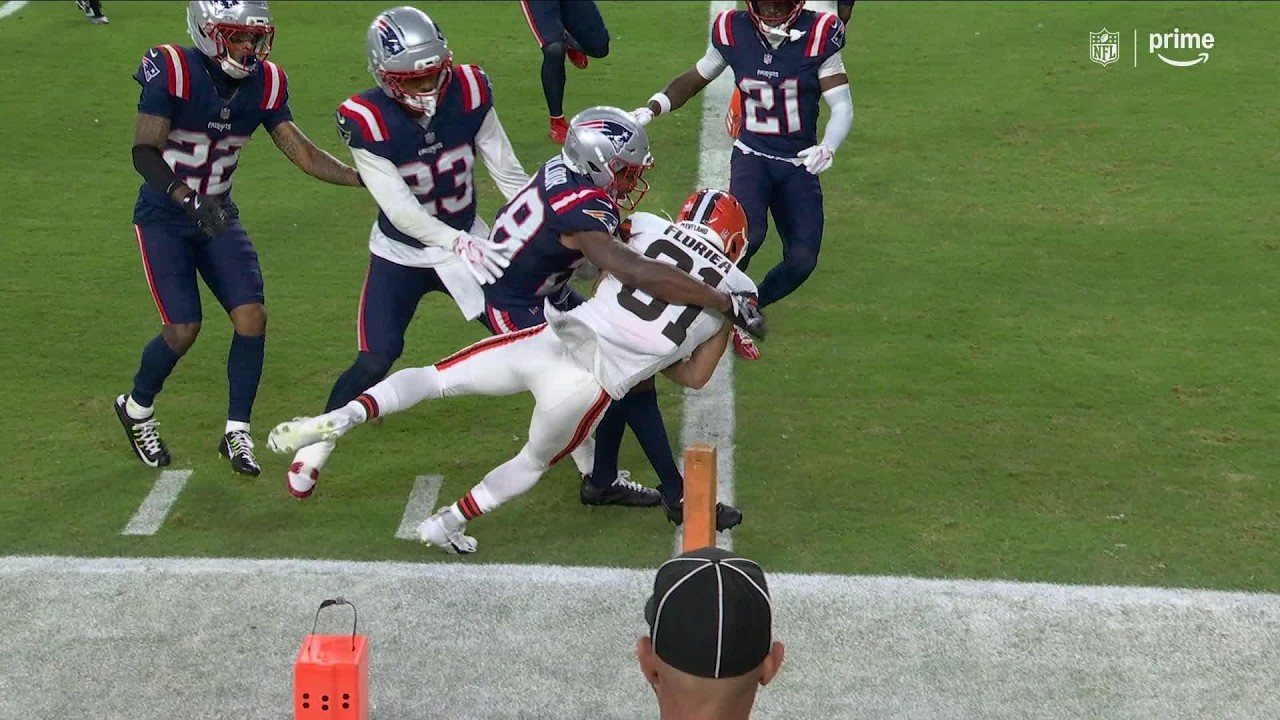 Luke Floriea fights for the pylon