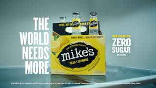 Mike's Hard Lemonade Woman sips lemonade while waiting for the paint to dry