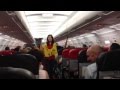 Funniest safety briefing ever with sexy flight attendant.