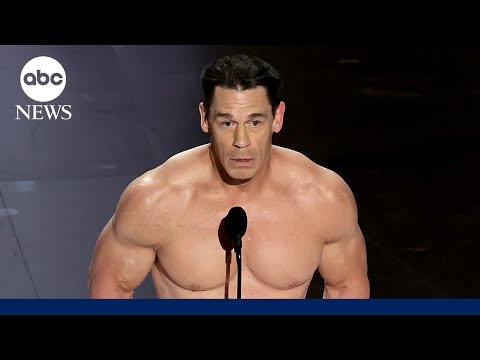 Nearly naked John Cena presents the award for Best Costume Design