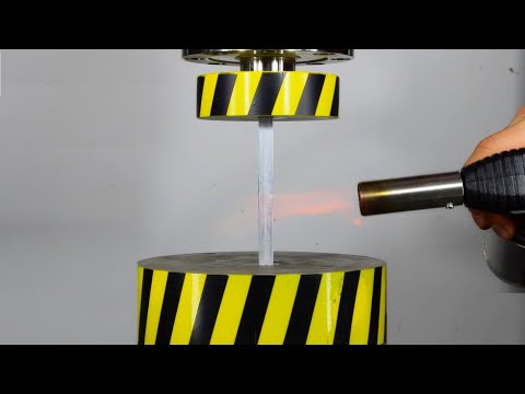 HEATING AND THERMAL EXPANSION OF METAL UNDER HYDRAULIC PRESS