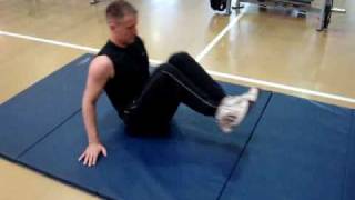 Seated Knee Tuck exercise video thumbnail