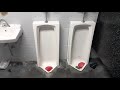 Two American Standard Stallbrook Urinals