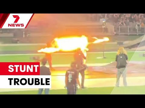 Prankster playing with fire burned in front of thousands of people | 7NEWS