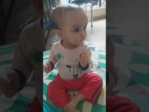 Baby Vidhu eating chocolate...