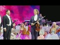 Andre Rieu plays lullaby to crying baby in Orlando