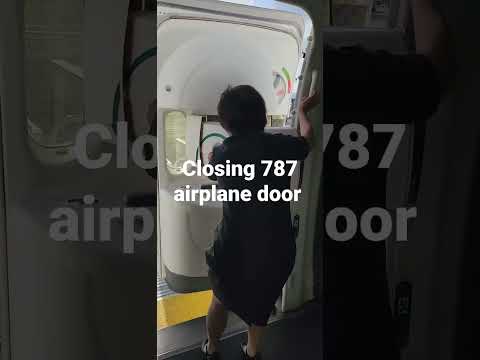 closing 787 Dream Liner airplane door