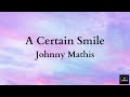 A Certain Smile - Johnny Mathis (Lyrics)