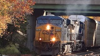 preview picture of video 'CSX 5464 & 7814 Pull Auto Rack Thru St Denis'