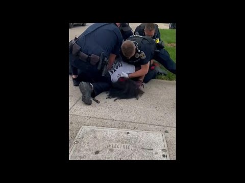 Louisville officer punches protester