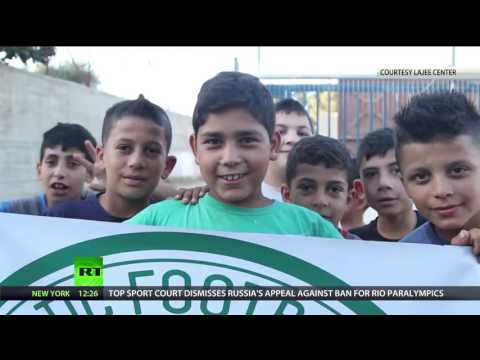 Thank you Celtic Wave of support for football club waving Palestine flags