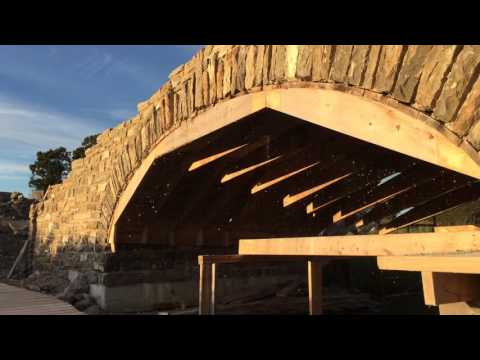 Traditional stone bridge formwork removal Almonte