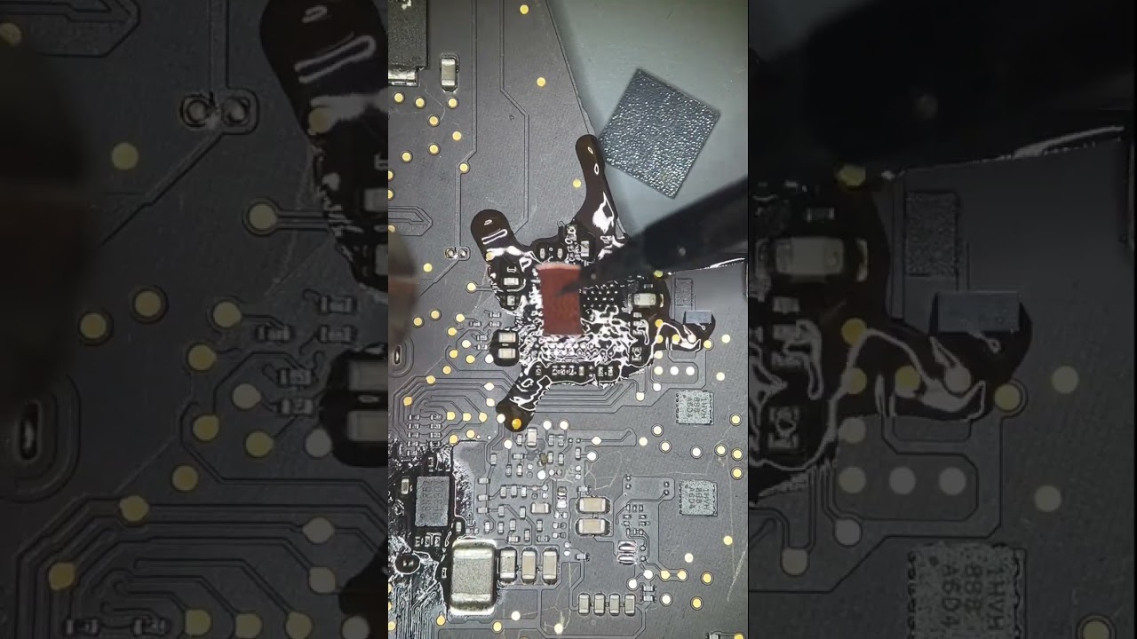 This is our process of removing a microchip and prepping the logic board for a new microchip