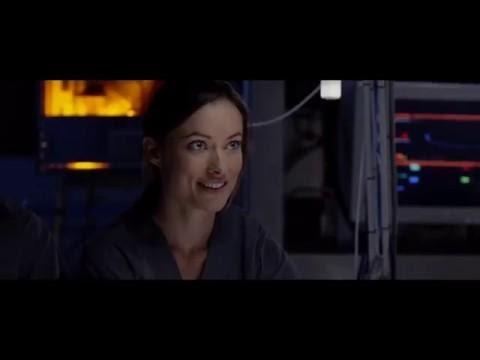 The Lazarus Effect (2015) official trailer frame with Olivia Wilde on the lab gurney under harsh fluorescents