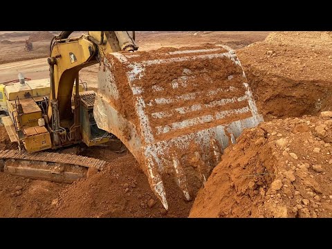 Caterpillar 365C Excavator Loading Mercedes & MAN Trucks