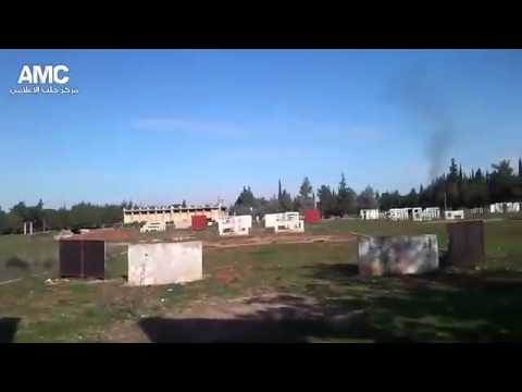 تقدم مقاتلي كتيبة مجاهدي الشهباء في أحد أطراف مدرسة المشاة أثناء مجريات معركة اللسيطرة على