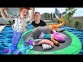 Mermaid PiLLOW FiGHT!!  Adley vs Dad magic trampoline battle with a Giant LoveSac in the Backyard!