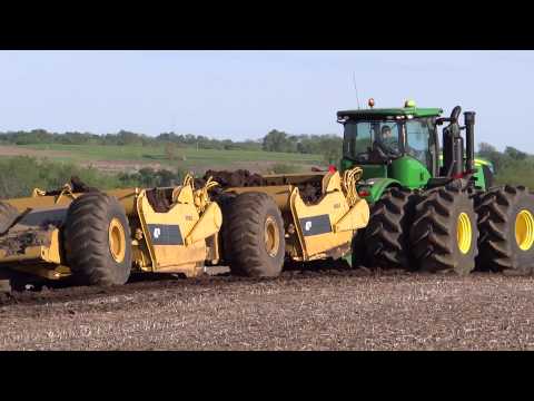 John Deere 9560R pulling Noble 417B Scrapers Loading