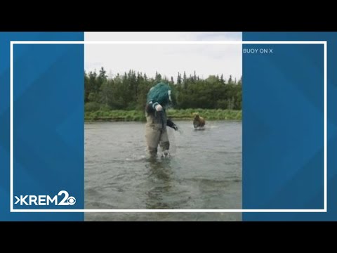 Watch: Video shows Seattle Kraken mascot being charged by grizzly bear while fishing