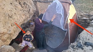 A gift from the cameraman: a tent for mother and his child in the mountains