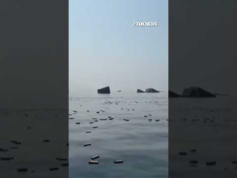 Containers FLOAT AT SEA after ship sinks near Strait of Hormuz #shorts