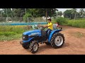 Small Tractor With Small Boy