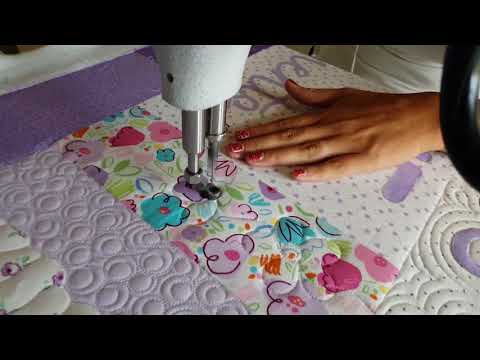 Machine Quilting Echoed Flowers by Natalia Bonner