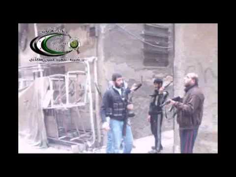 التقدم لاقتحام كتيبة الشهيد حسين مفعلاني لأحد مواقع قوات النظام في شارع فلسطين في مخيم اليرموك في مدينة دمشق