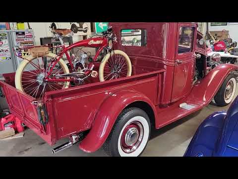 Indian Motorcycle Bicycle in back of a 1933 Ford Pickup.