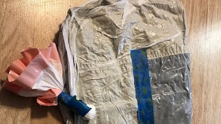 How to vacuum seal with a trash bag with any clothings.