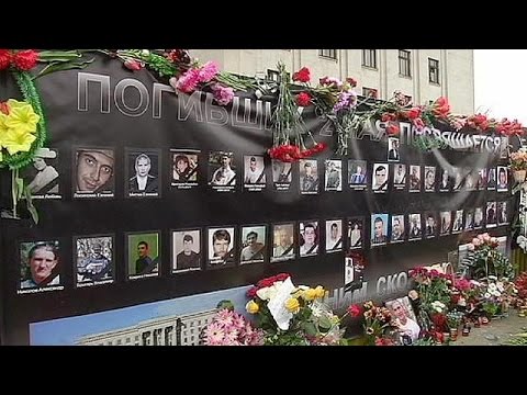 Peope in the Ukrainian port of Odessa remember victims who died during clashes a year ago
