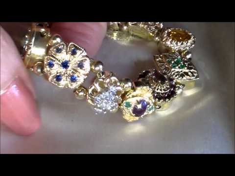 39.1 Grams  7" 8.1 Carats slide charm Bracelet