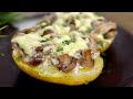 Delicious baked potatoes with mushrooms. A simple and delicious dinner.