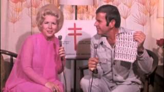 Bette Rogge, Christmas Seal Chairman, and Paul Lynde promote the 1974 Christmas Seals