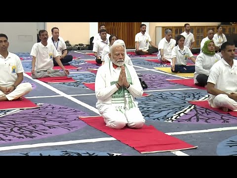 India's Modi does yoga in Kashmir on 10th International Yoga Day | AFP