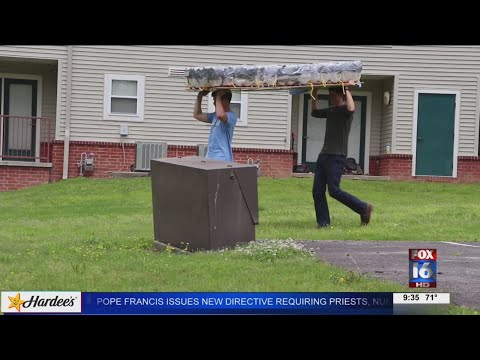 Digital Original: University students build raft, float to class after severe flooding