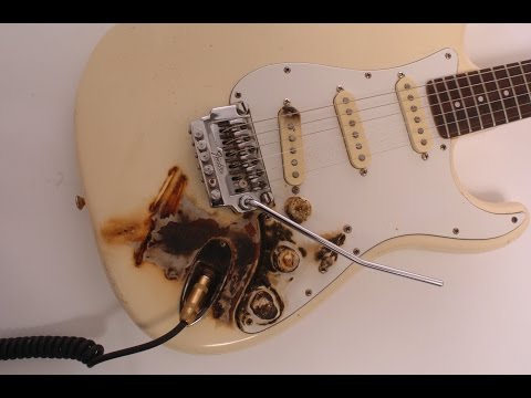Fix Static Noise From Touching Your Pickguard.  By Scott Grove