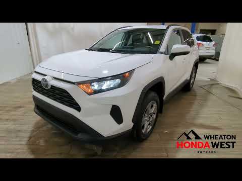 2025 Toyota RAV4 Hybrid LE AWD in White for sale at Wheaton Honda West in Calgary, AB