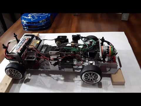 RC car w/3 speed manual gearbox & Nissan Skyline body.