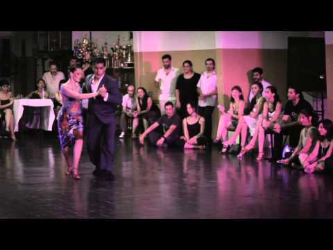  Sabrina Veliz  and  Ruben Veliz  are  dancing  to  the  vals  "  Pobre Flor  "  at  Rosario Tango Festival  in  2015