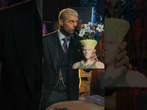 With that hair, there’s nothing this popcorn bucket can’t do.