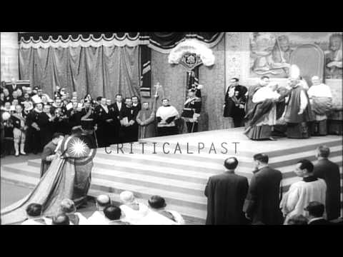 Pope John XXIII is carried on the sedia gestatoria and he elevates new cardinals ...HD Stock Footage