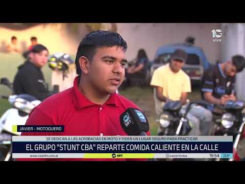 Lindo ejemplo: el grupo "Stunt Cba" reparte comida caliente en las calles de la ciudad