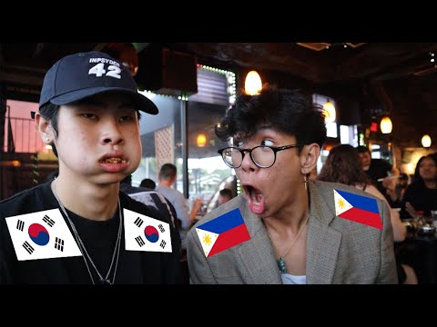 A Korean and Filipino walk inside a KBBQ restaurant...